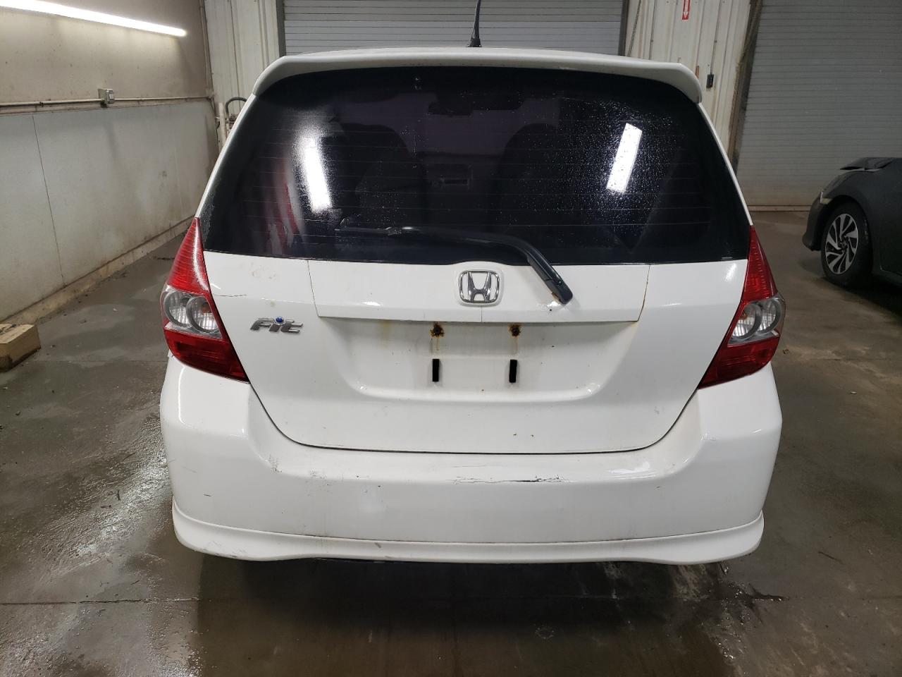 2007 Honda Fit S VIN: JHMGD386X7S004924 Lot: 77953004