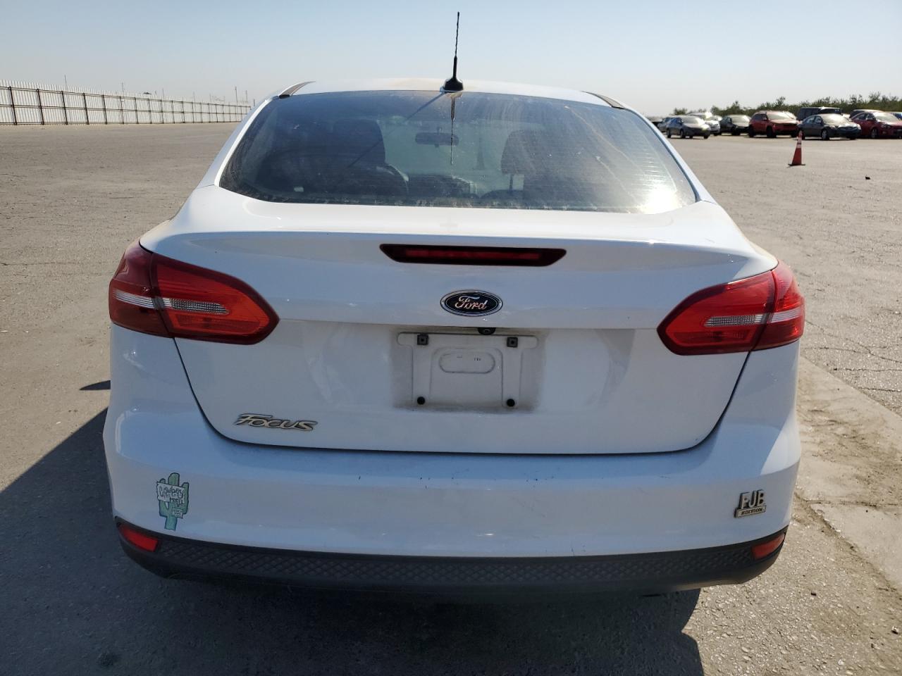 2018 Ford Focus S VIN: 1FADP3E29JL313594 Lot: 72845314