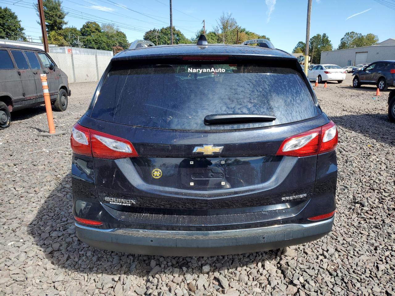 2020 Chevrolet Equinox Premier VIN: 3GNAXNEV2LS585590 Lot: 73650194