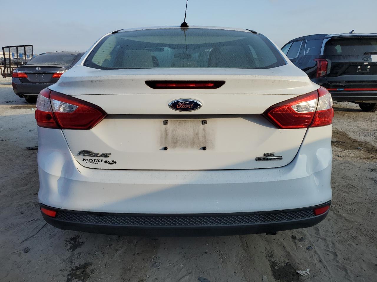 2013 Ford Focus Se VIN: 1FADP3F25DL300196 Lot: 77998994