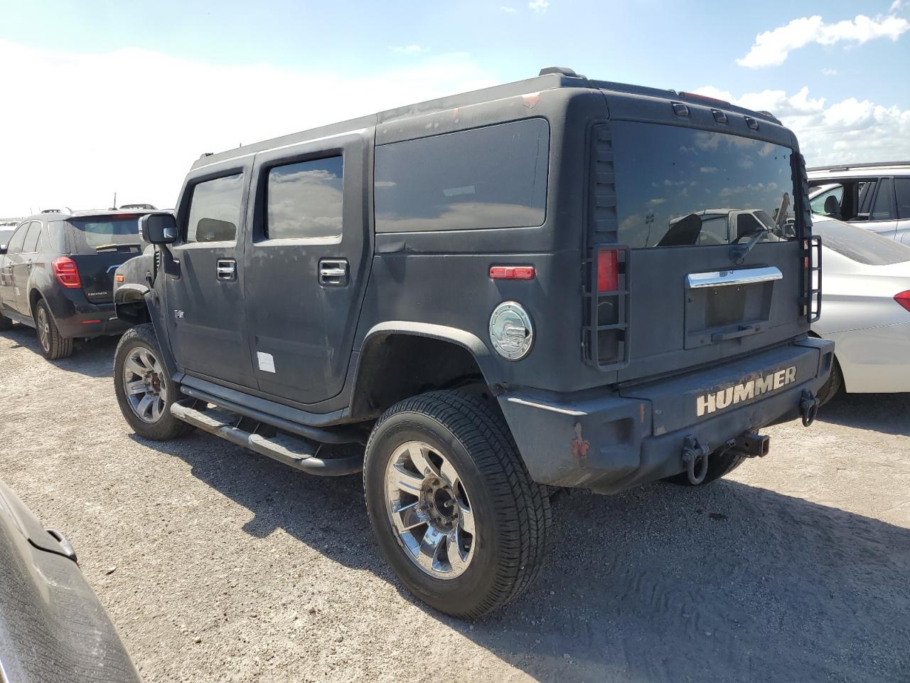 2003 Hummer H2 VIN: 5GRGN23U13H143781 Lot: 74318724