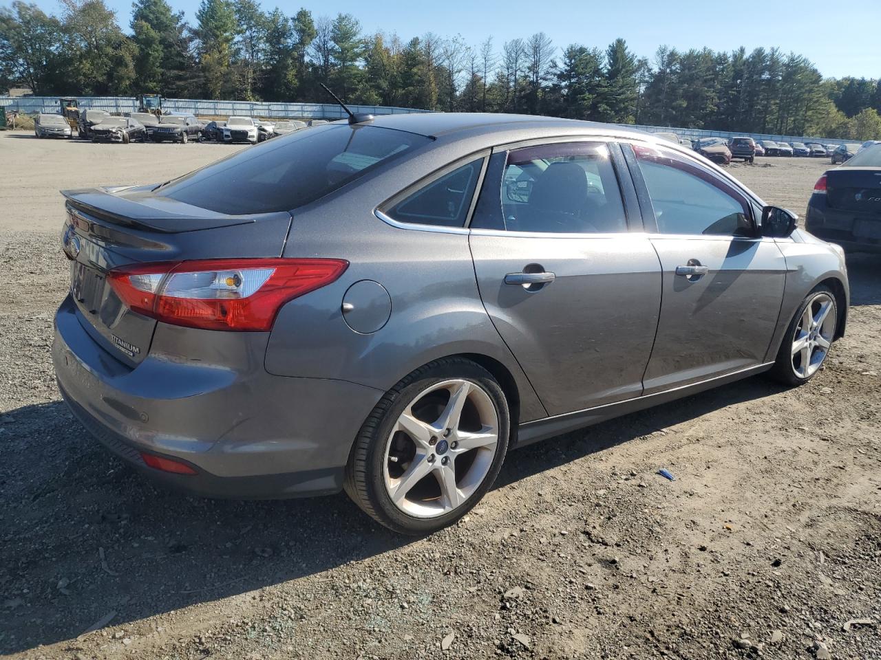 2014 Ford Focus Titanium VIN: 1FADP3J20EL357060 Lot: 76025984