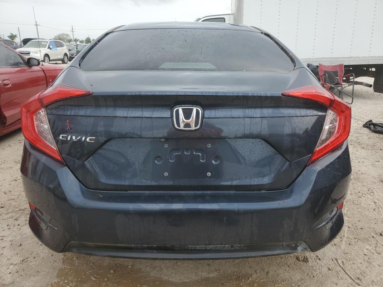 2018 Honda Civic Lx VIN: 19XFC2F57JE040181 Lot: 74930744