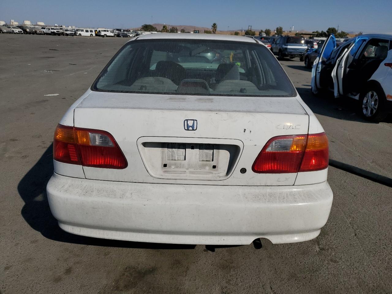 JHMEJ6678YS009697 2000 Honda Civic Lx