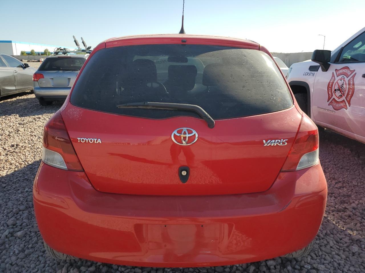 2009 Toyota Yaris VIN: JTDKT903X95249842 Lot: 74138334