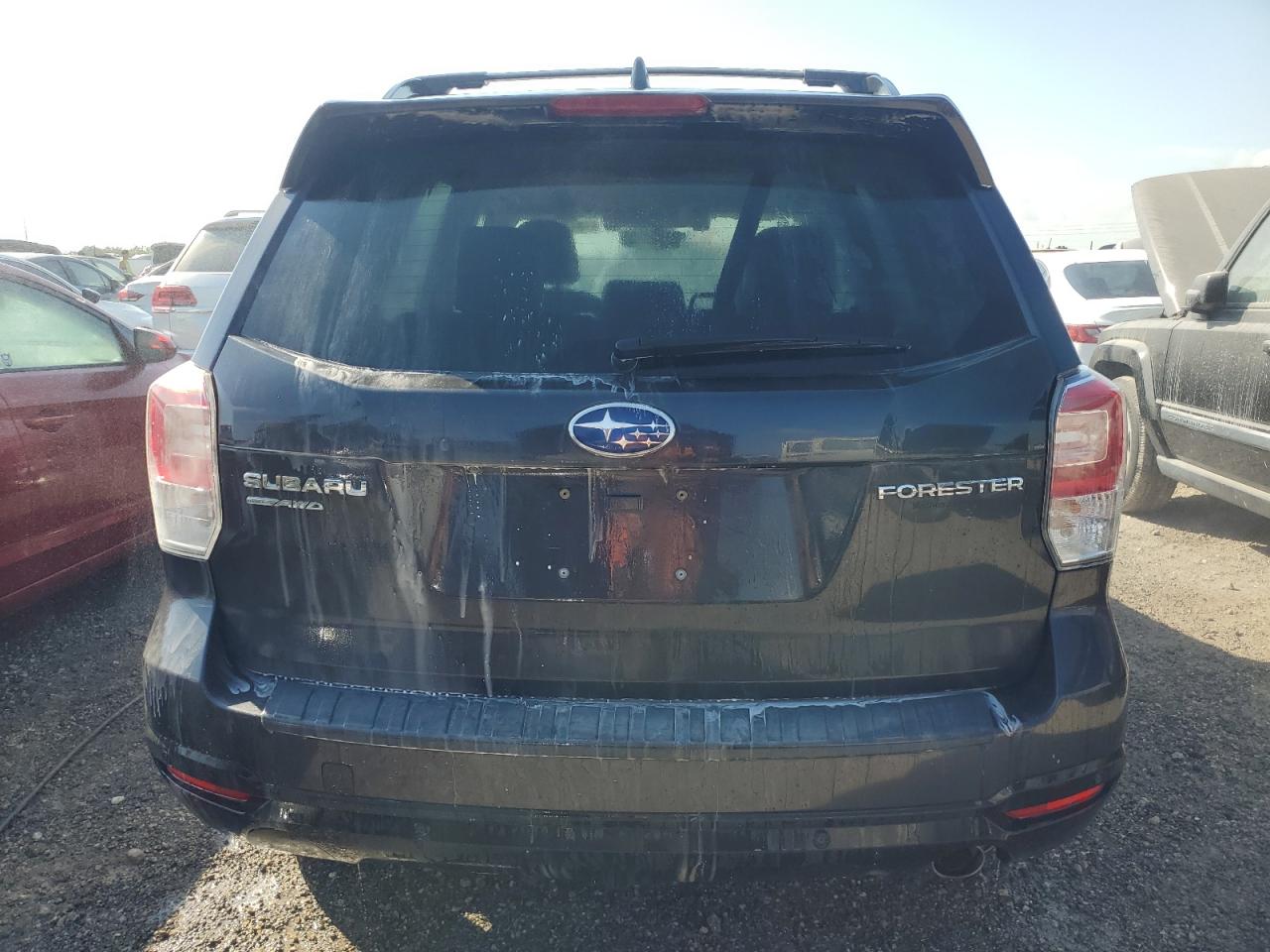 2018 Subaru Forester 2.5I Touring VIN: JF2SJAWC0JH458879 Lot: 74487924