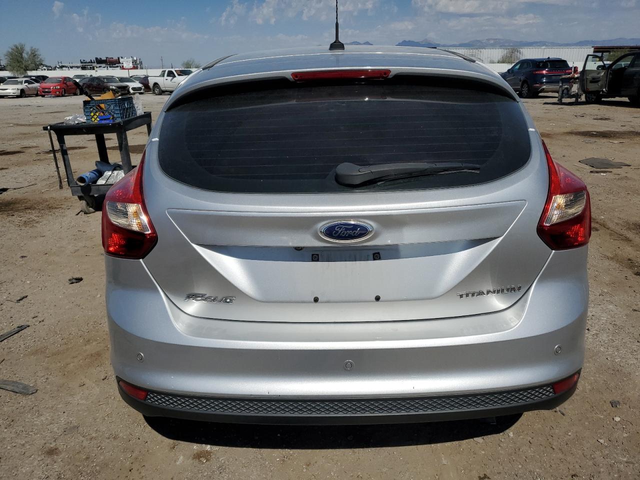 2014 Ford Focus Titanium VIN: 1FADP3N22EL162488 Lot: 75566504