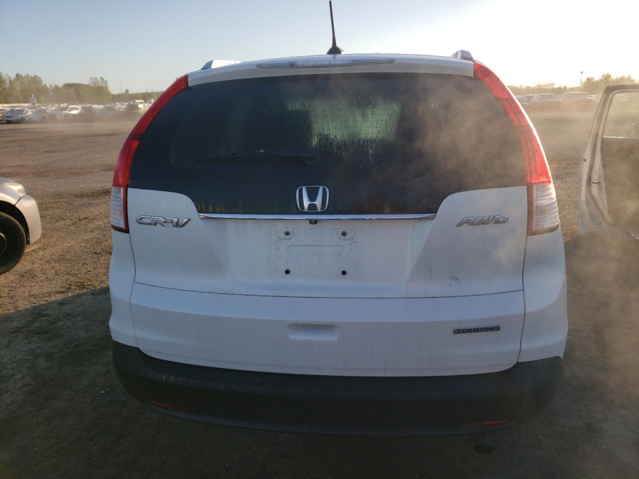 2014 Honda Cr-V Touring VIN: 2HKRM4H92EH118597 Lot: 73322864