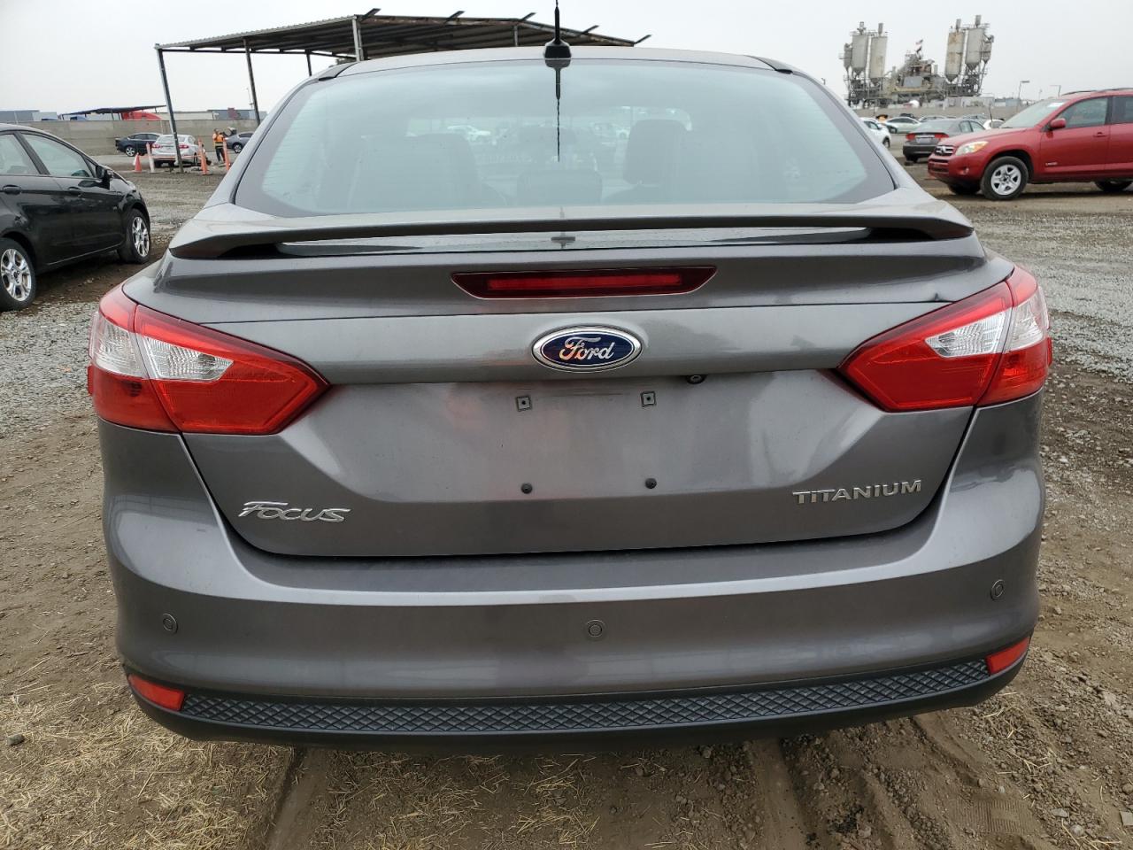 2014 Ford Focus Titanium VIN: 1FADP3J22EL420997 Lot: 76318834