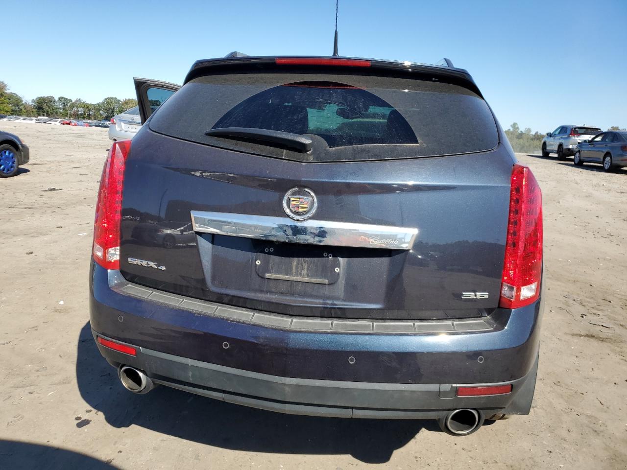 2014 Cadillac Srx Performance Collection VIN: 3GYFNFE33ES560428 Lot: 74988214