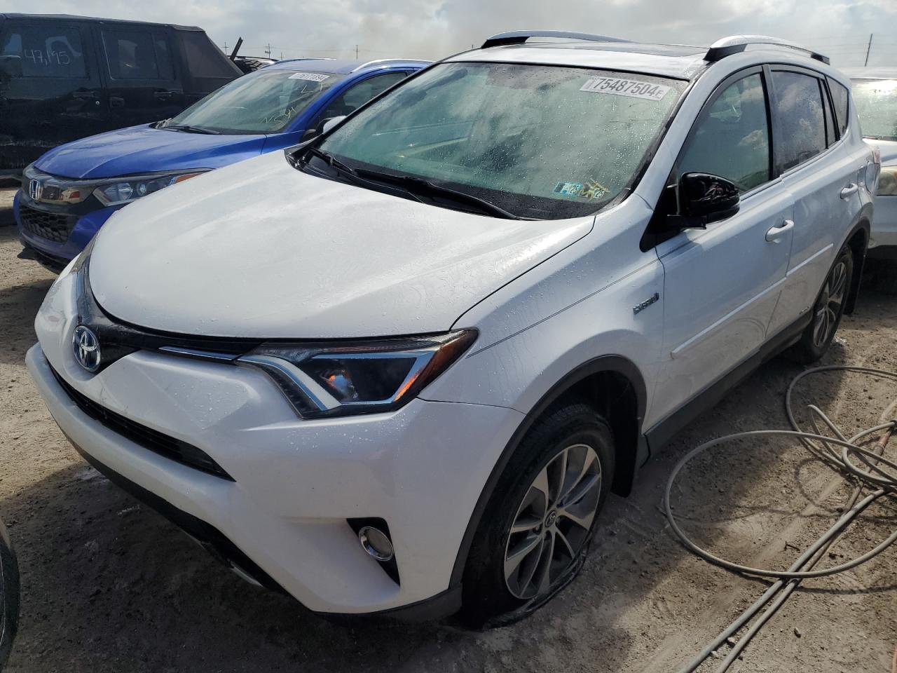 VIN JTMRJREV0GD043415 2016 TOYOTA RAV4 no.1