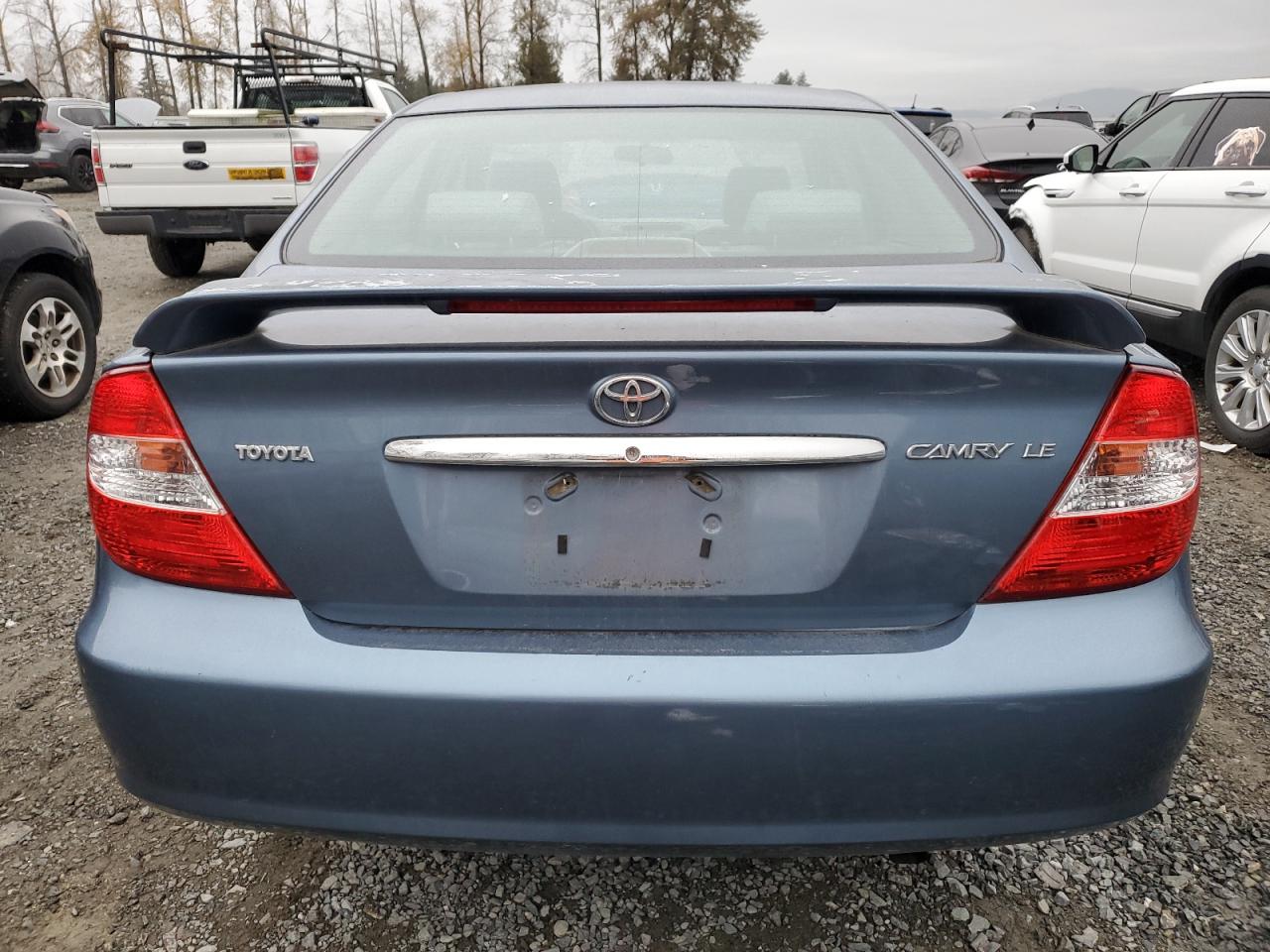 2003 Toyota Camry Le VIN: JTDBE32K130153274 Lot: 76561004