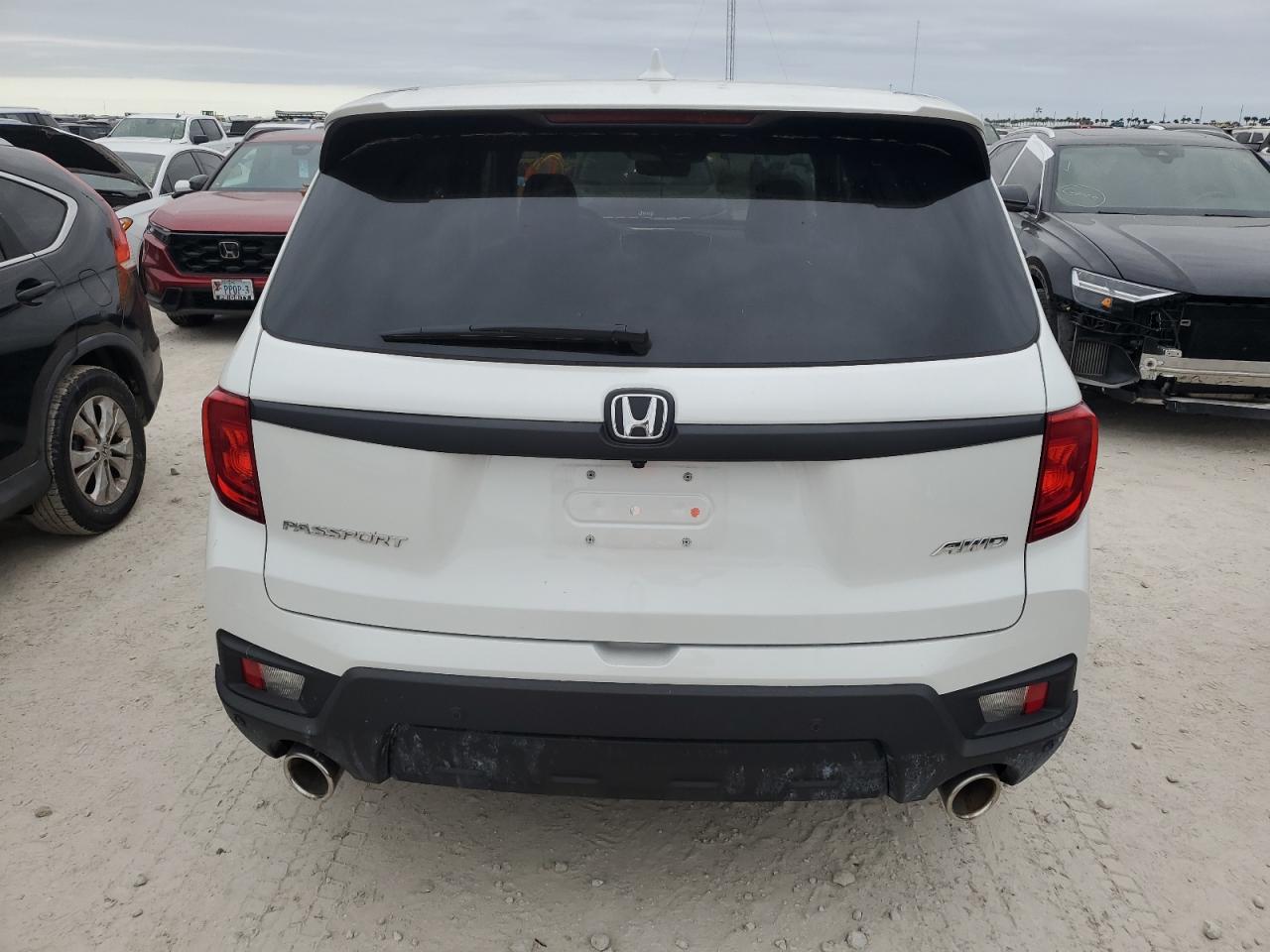 2022 Honda Passport Exl VIN: 5FNYF8H55NB011813 Lot: 74960124