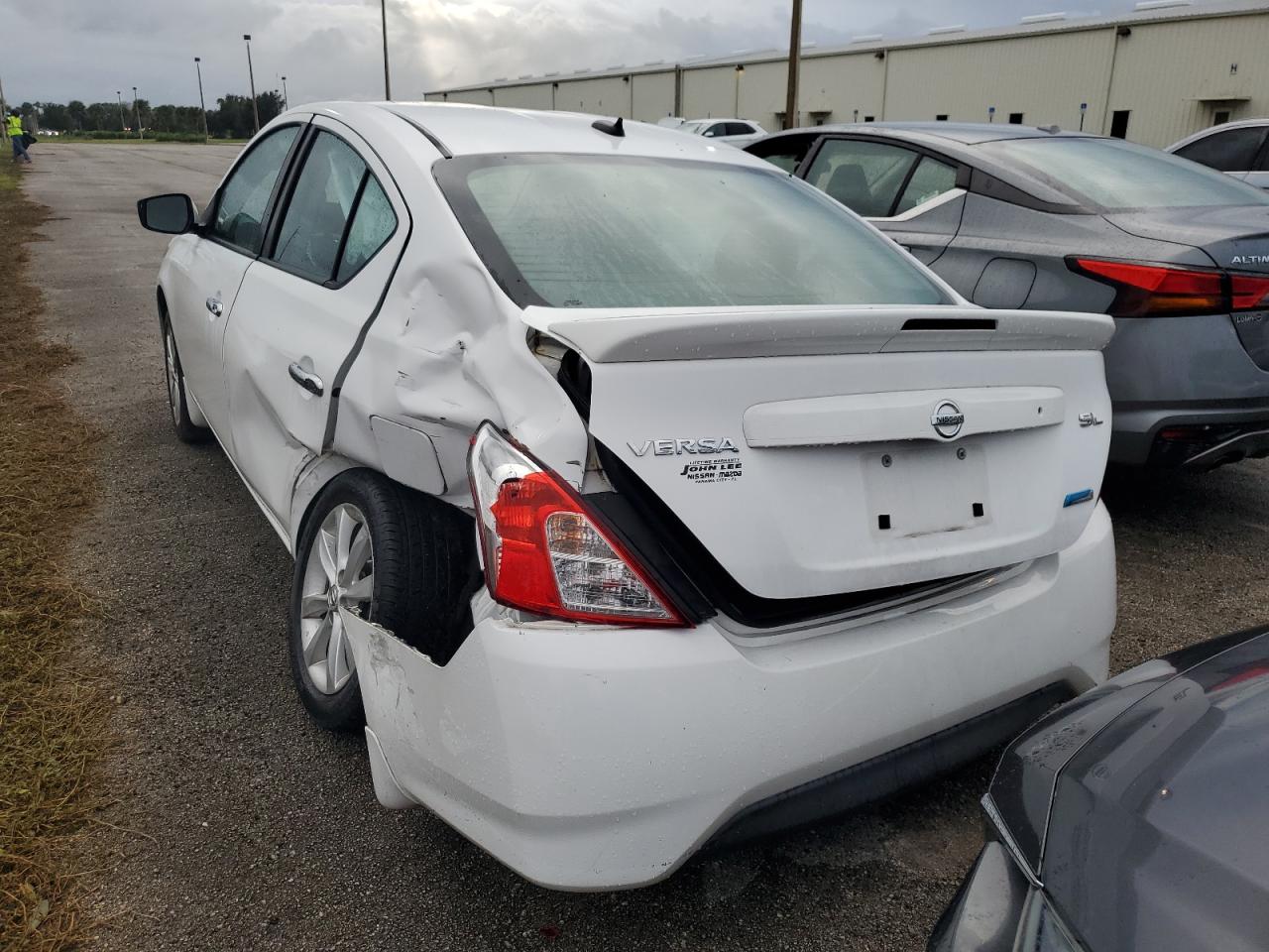 2015 Nissan Versa S VIN: 3N1CN7AP4FL869038 Lot: 75447304