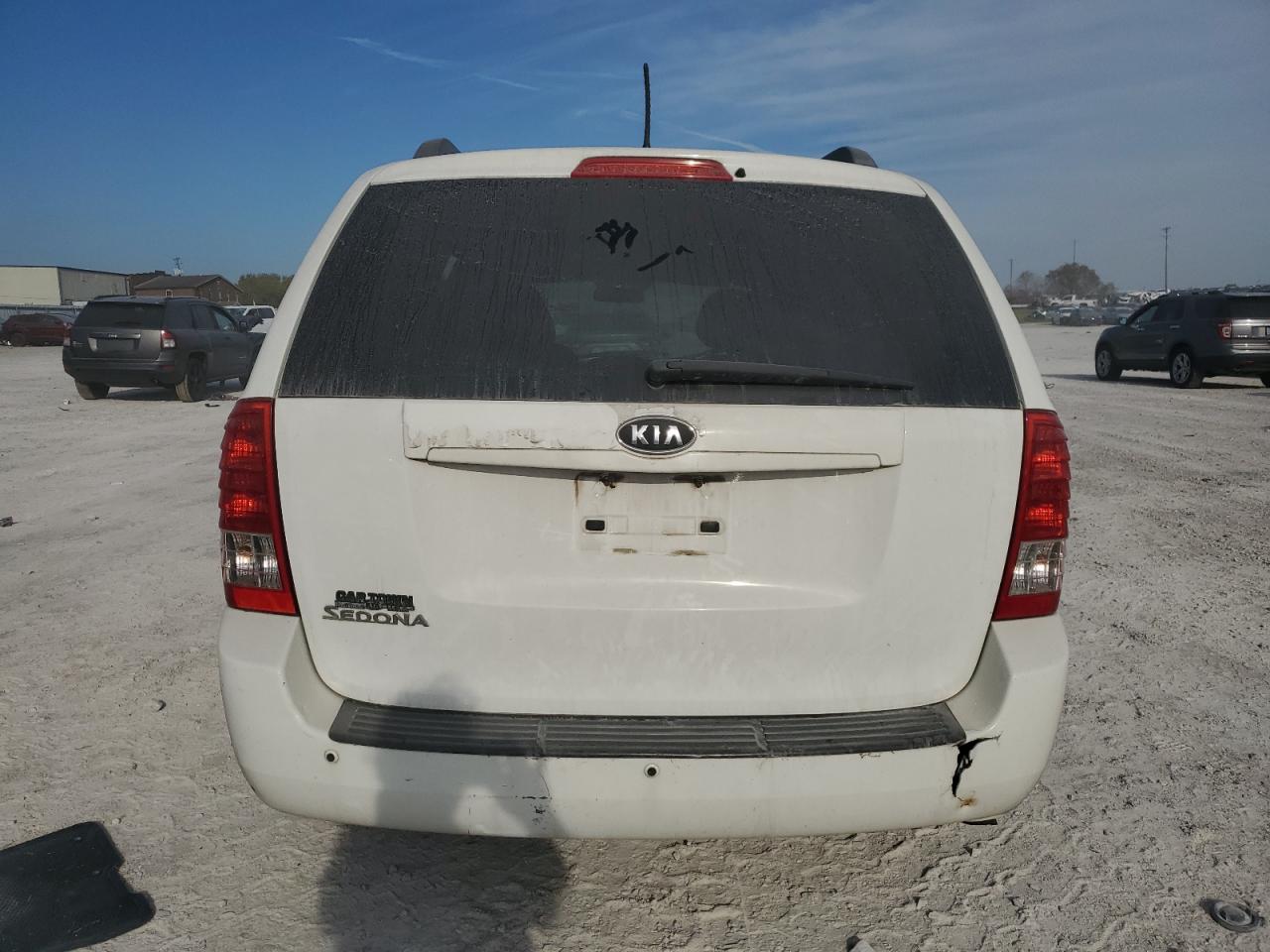 2012 Kia Sedona Lx VIN: KNDMG4C74C6430449 Lot: 77200304