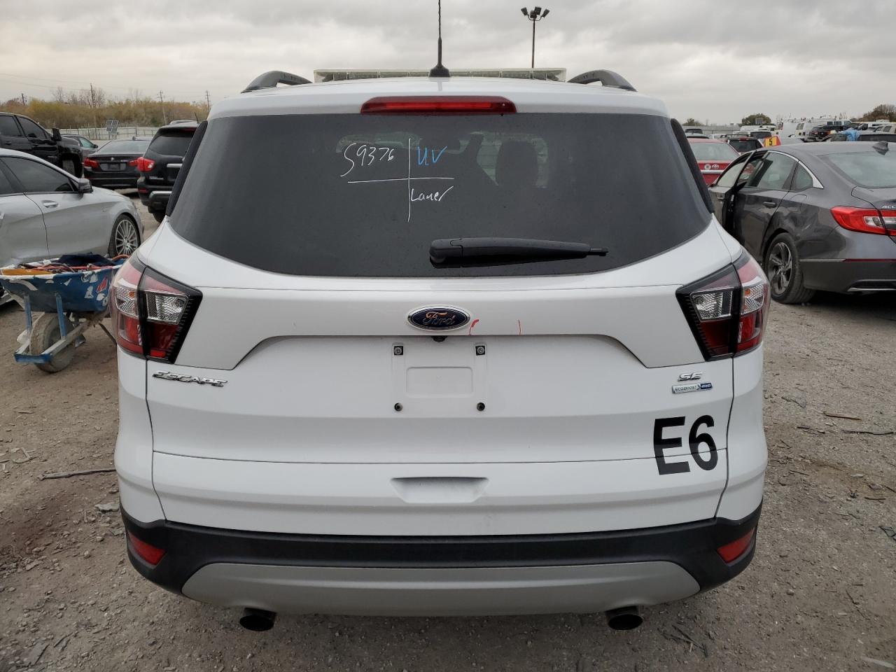 2018 Ford Escape Se VIN: 1FMCU9GDXJUD38087 Lot: 77865594