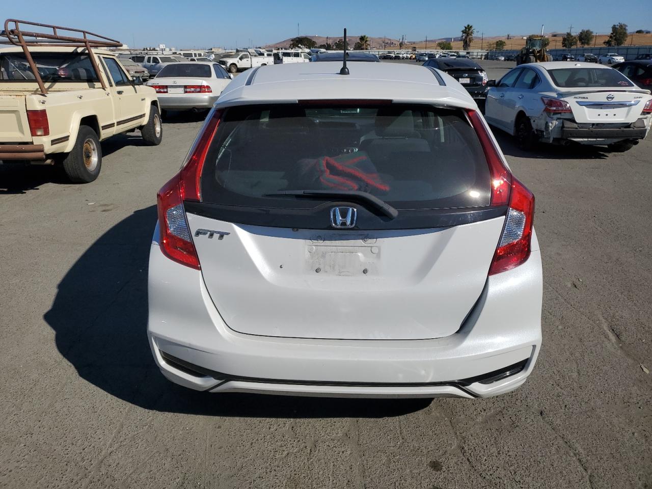 2019 Honda Fit Lx VIN: 3HGGK5H40KM744163 Lot: 76180384