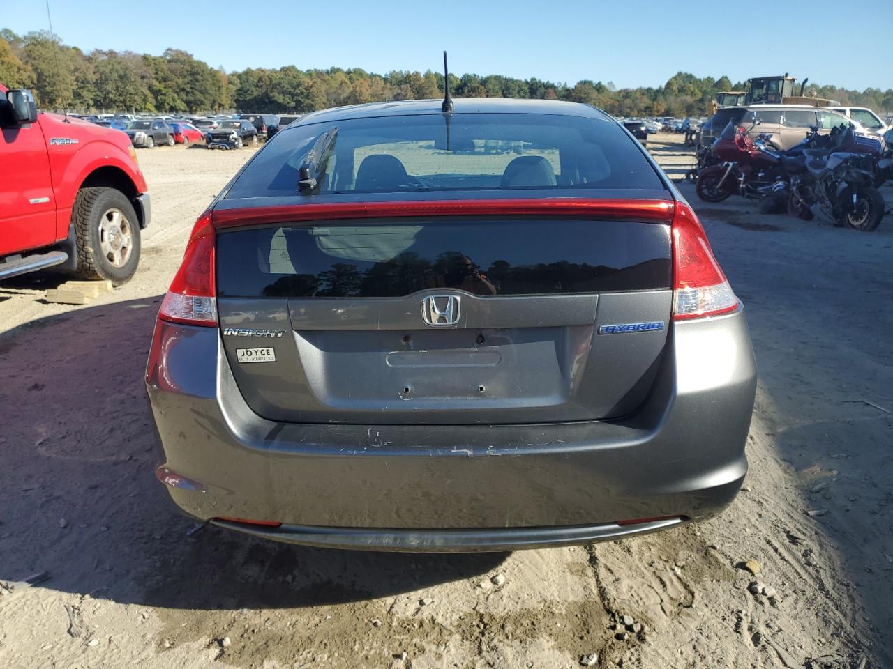 2010 Honda Insight Ex VIN: JHMZE2H72AS033513 Lot: 74672724