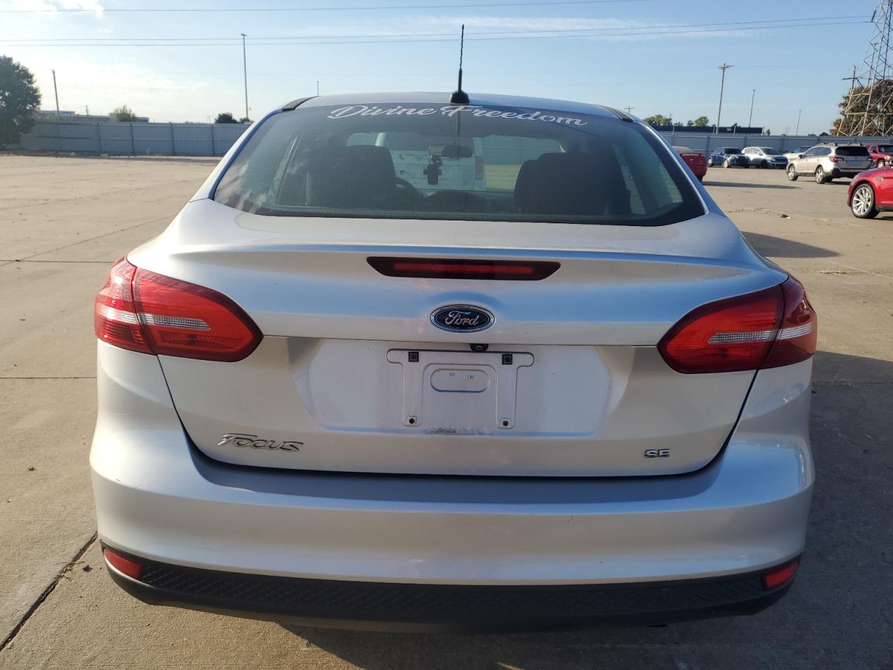 2018 Ford Focus Se VIN: 1FADP3F23JL309796 Lot: 77523104