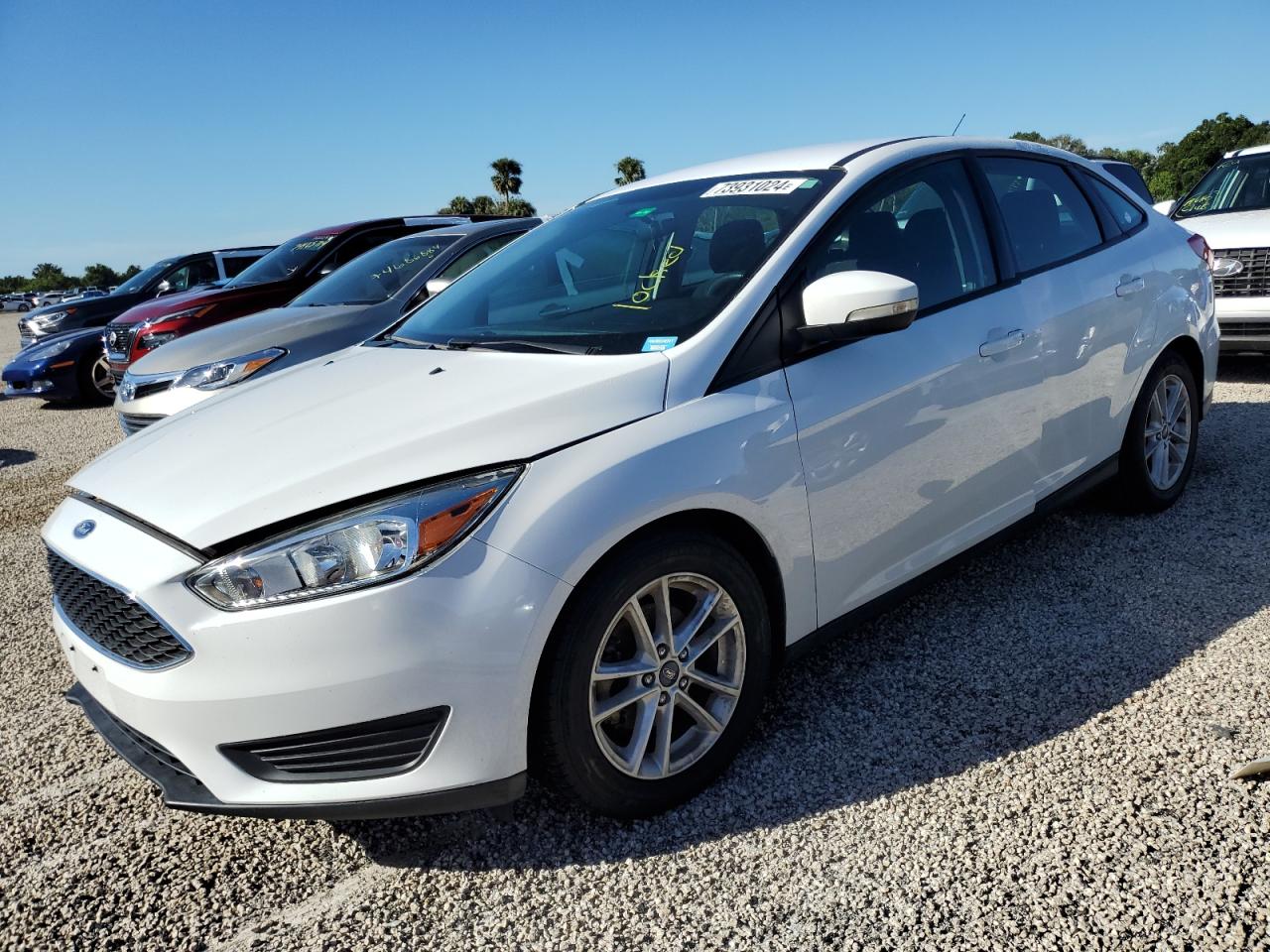 VIN 1FADP3F21HL314280 2017 FORD FOCUS no.1