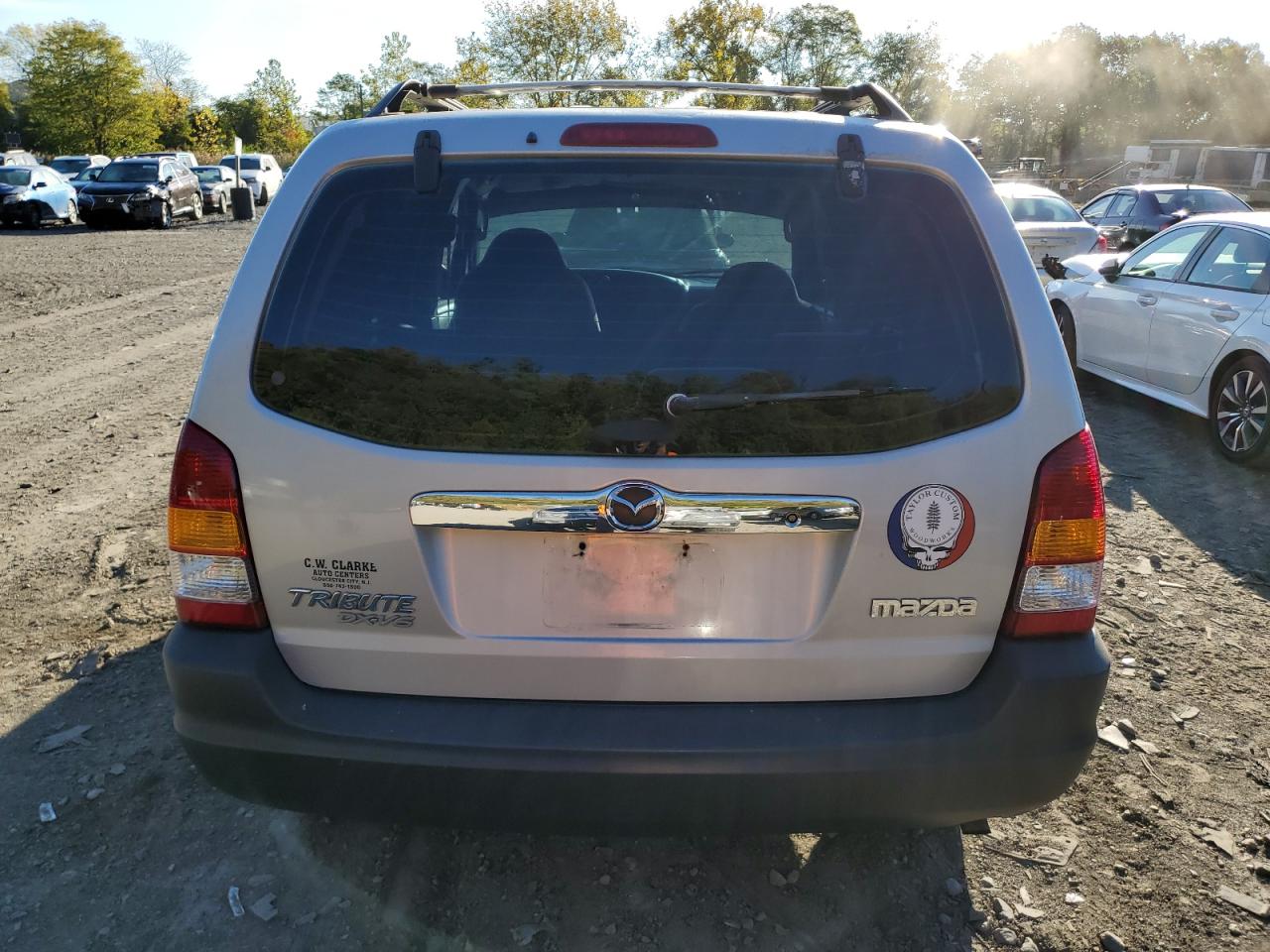 2001 Mazda Tribute Dx VIN: 4F2YU06141KM32636 Lot: 75809004