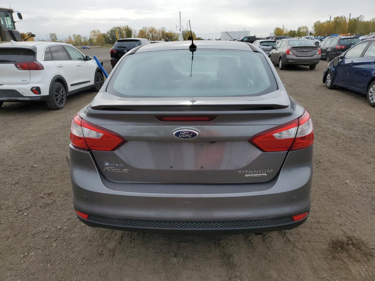 2013 Ford Focus Titanium VIN: 1FADP3J22DL346656 Lot: 72546084