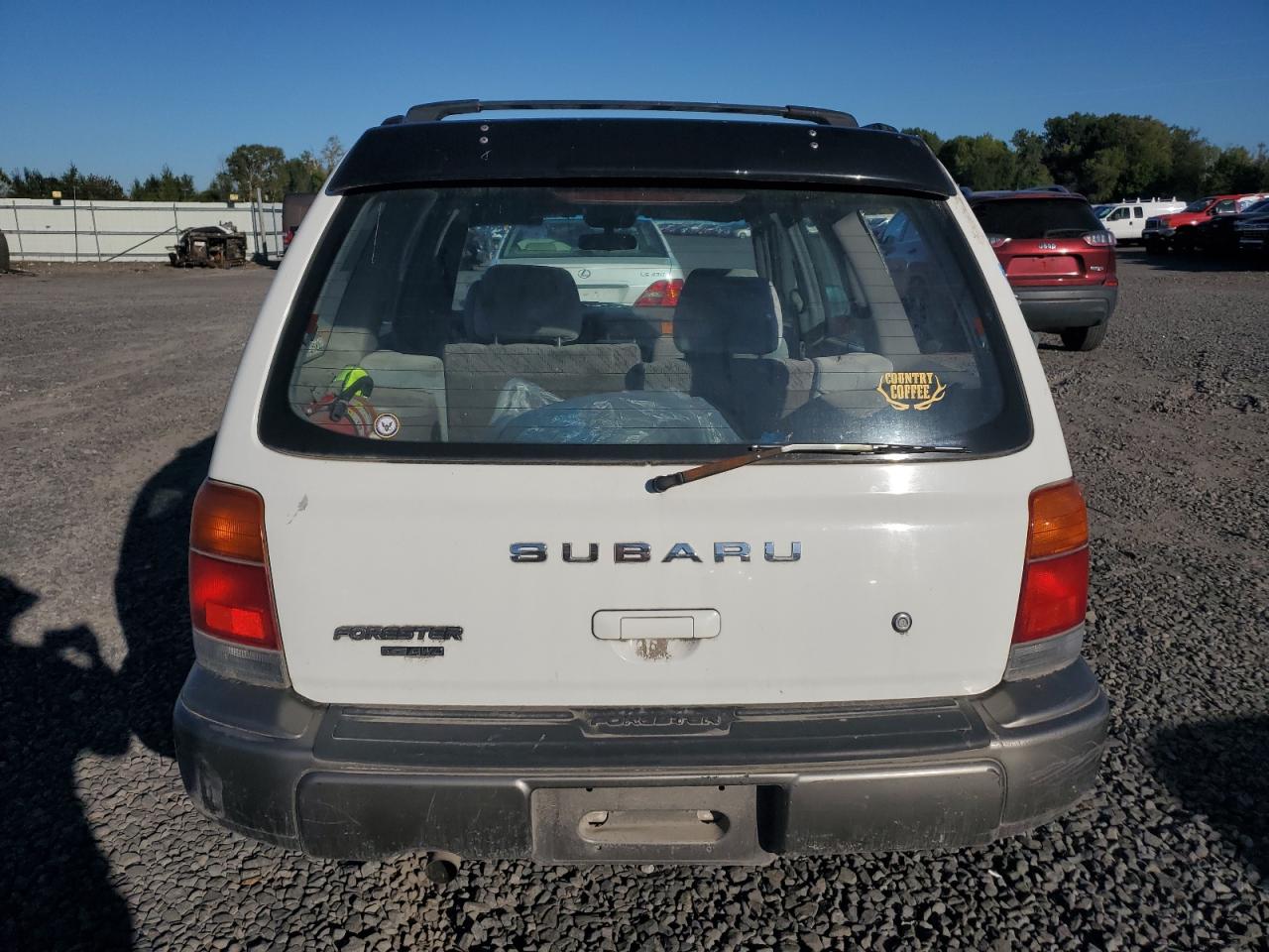 1998 Subaru Forester S VIN: JF1SF6559WH770566 Lot: 74371824