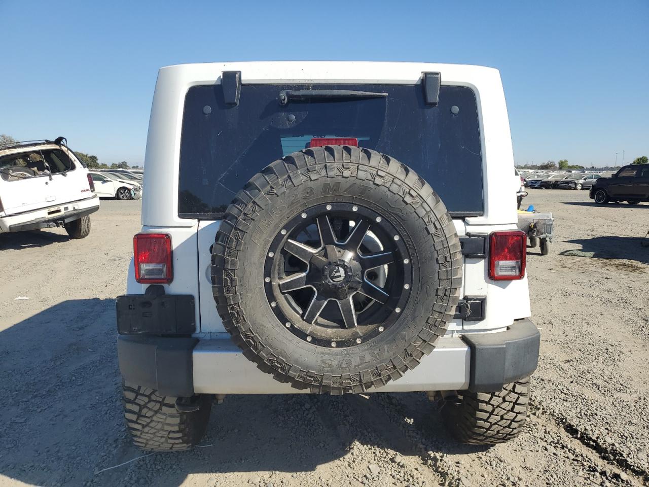 2015 Jeep Wrangler Unlimited Sahara VIN: 1C4BJWEGXFL691026 Lot: 74605824