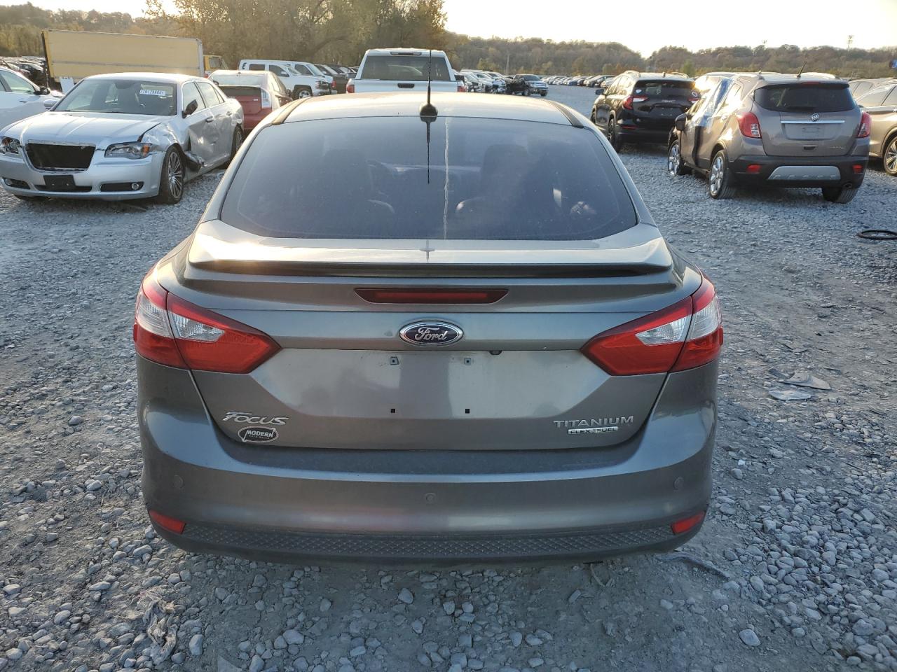 2014 Ford Focus Titanium VIN: 1FADP3J23EL401763 Lot: 77846894