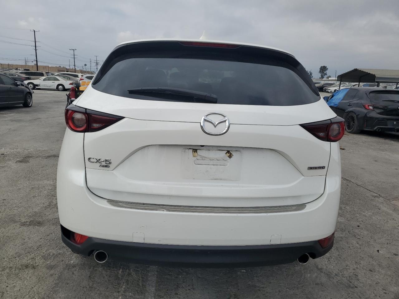 2021 Mazda Cx-5 Touring VIN: JM3KFBCM2M0467421 Lot: 76362244