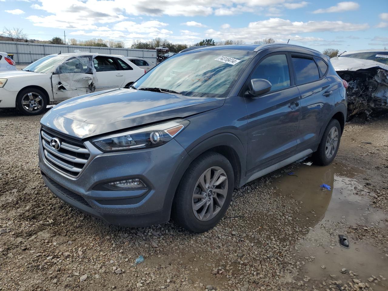 KM8J3CA40HU389625 2017 HYUNDAI TUCSON - Image 1