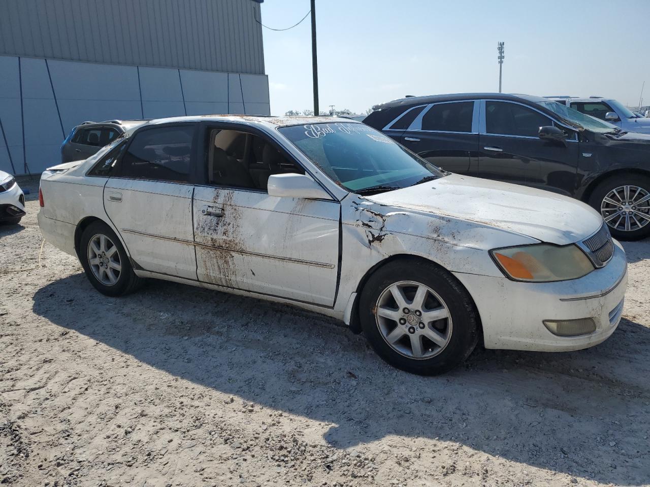 2002 Toyota Avalon Xl VIN: 4T1BF28B92U239885 Lot: 76189244