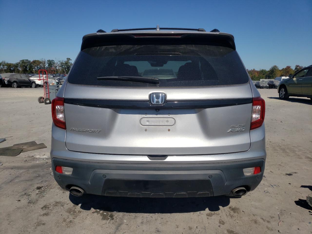 2019 Honda Passport Elite VIN: 5FNYF8H06KB010122 Lot: 75930974