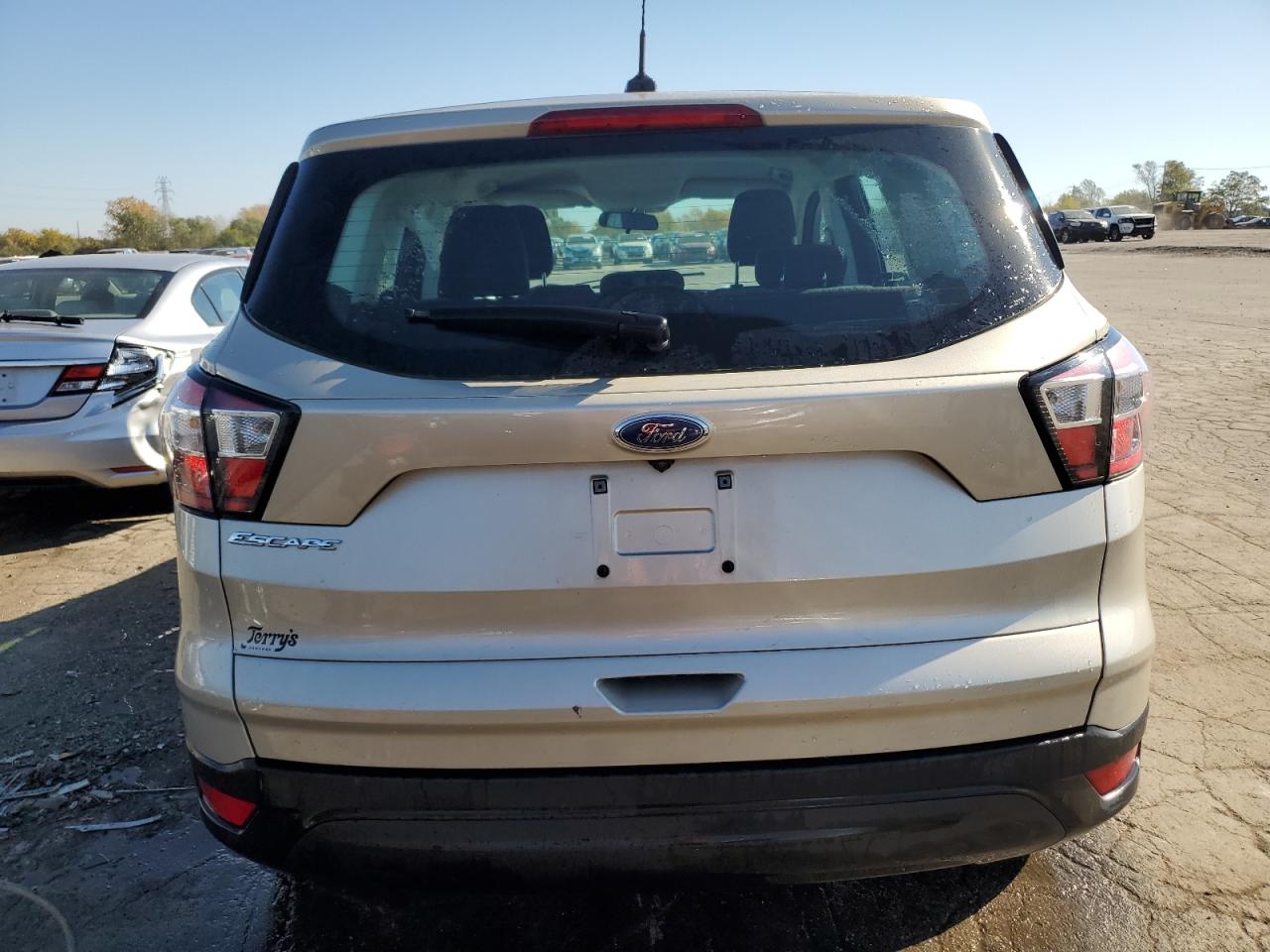 2018 Ford Escape S VIN: 1FMCU0F75JUA69939 Lot: 76984864