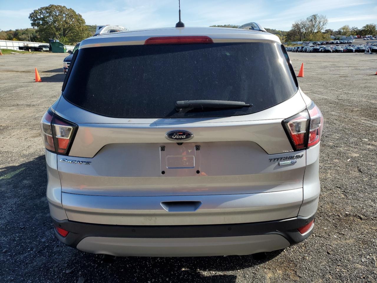 2017 Ford Escape Titanium VIN: 1FMCU9JDXHUA31599 Lot: 76625404