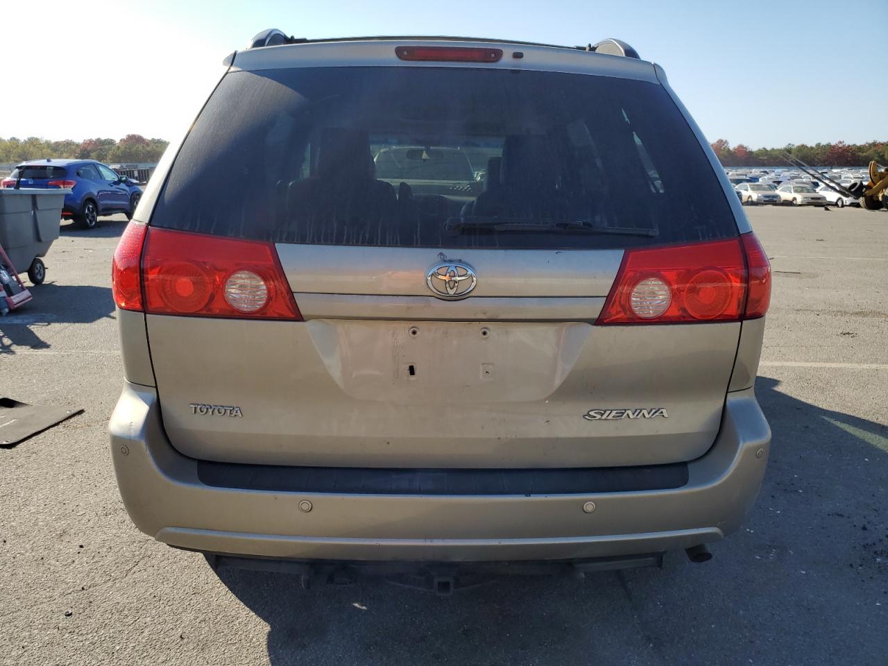 2010 Toyota Sienna Xle VIN: 5TDYK4CC2AS302978 Lot: 76489914