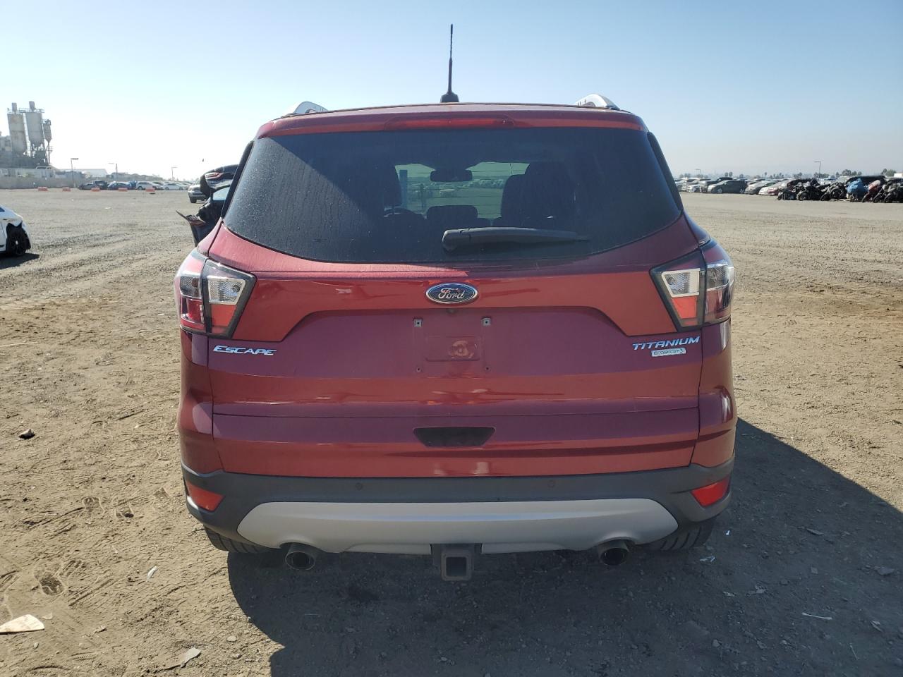 2017 Ford Escape Titanium VIN: 1FMCU0J91HUA03875 Lot: 75860404