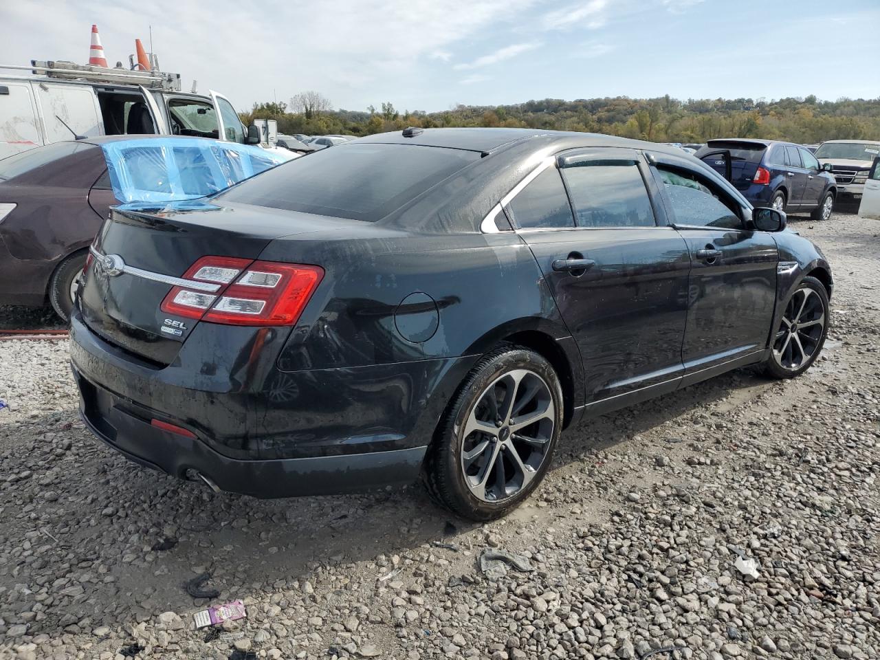 2015 Ford Taurus Sel VIN: 1FAHP2H80FG148157 Lot: 76164414