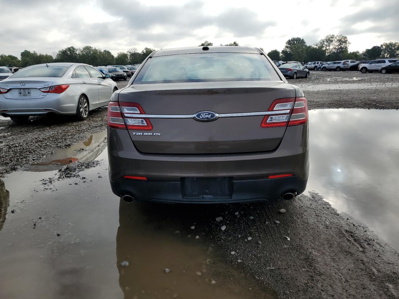 2015 Ford Taurus Se VIN: 1FAHP2D80FG123801 Lot: 74039764