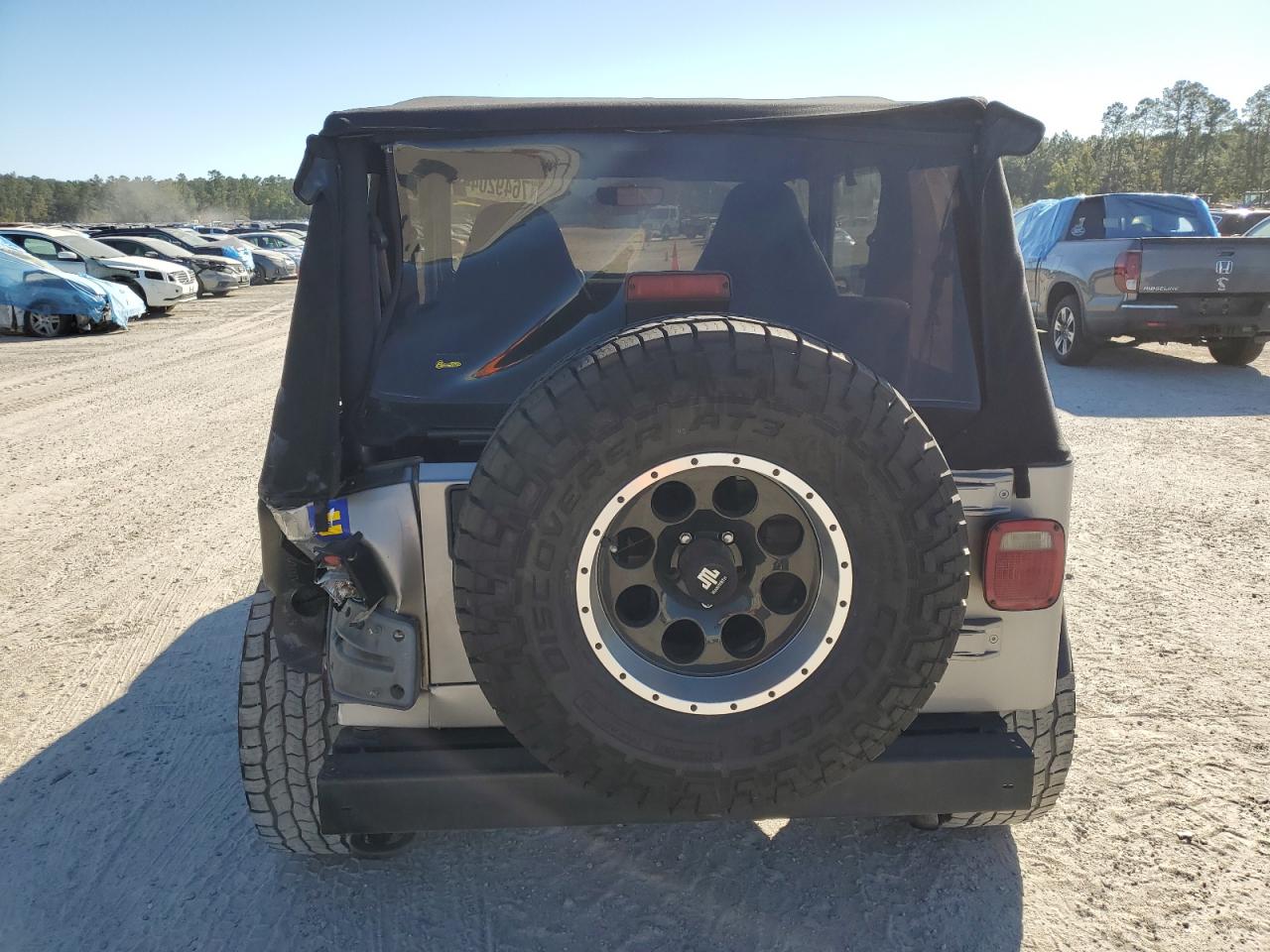 2002 Jeep Wrangler / Tj Sport VIN: 1J4FA49S92P711090 Lot: 76492044