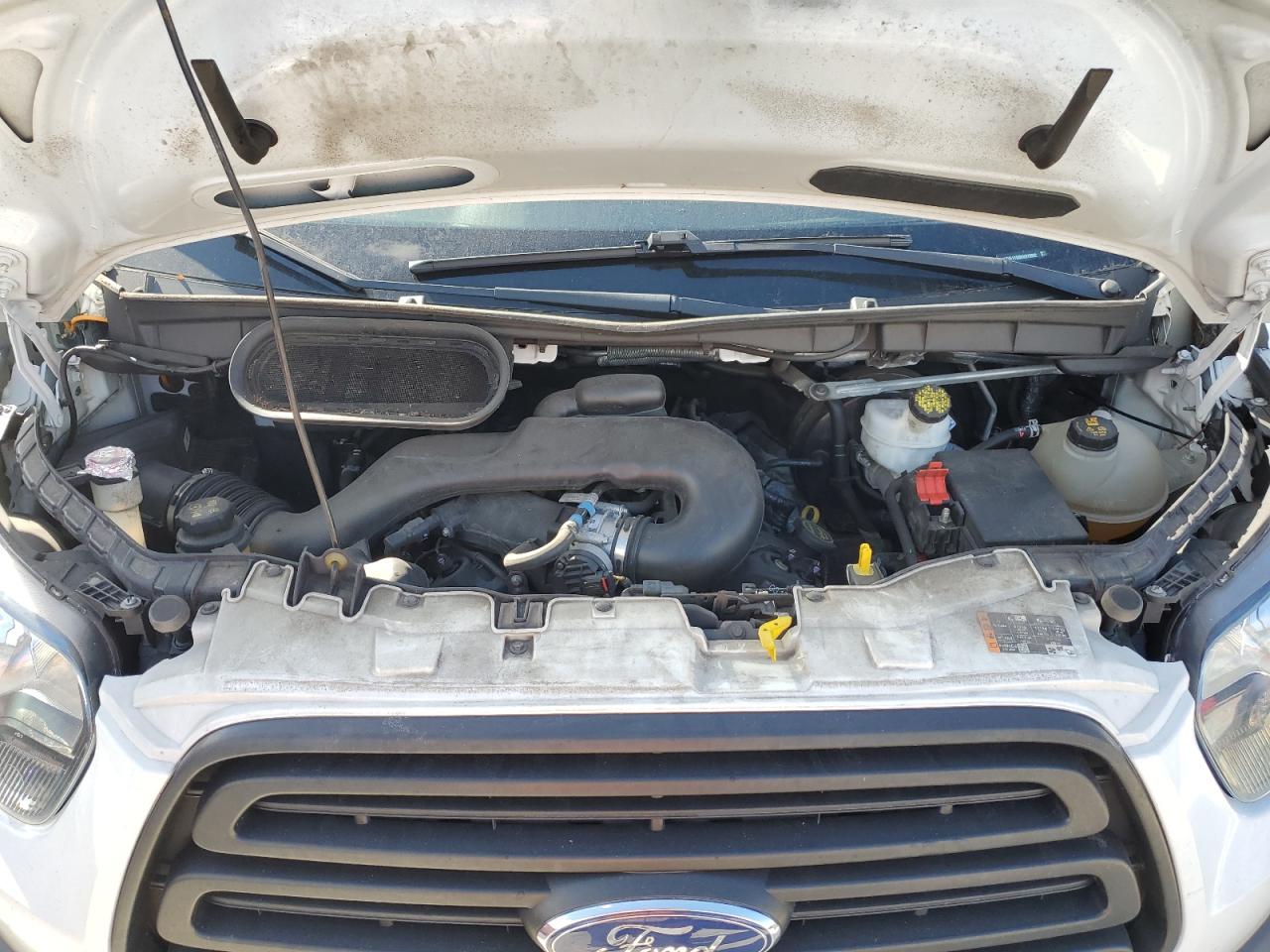 2019 Ford Transit T-150 VIN: 1FTYE1YM0KKB79892 Lot: 77016874