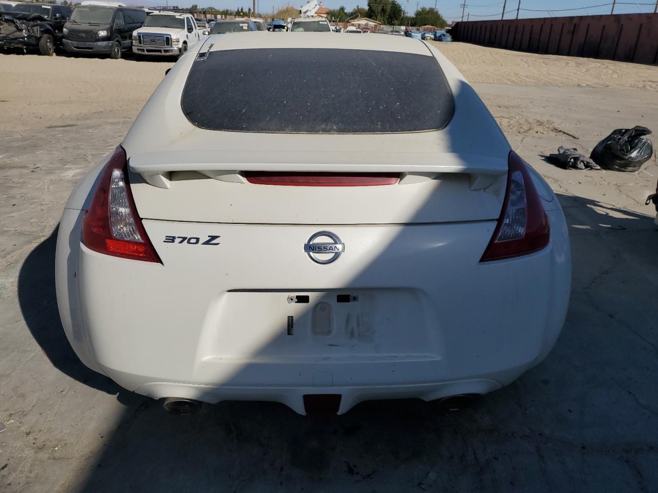 2014 Nissan 370Z Base VIN: JN1AZ4EH7EM630990 Lot: 77811544