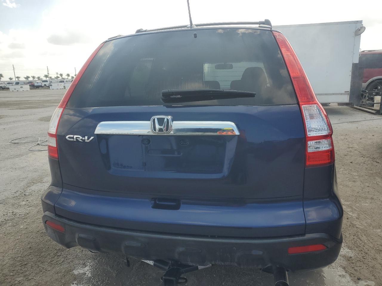 2009 Honda Cr-V Exl VIN: JHLRE38769C000627 Lot: 75874174