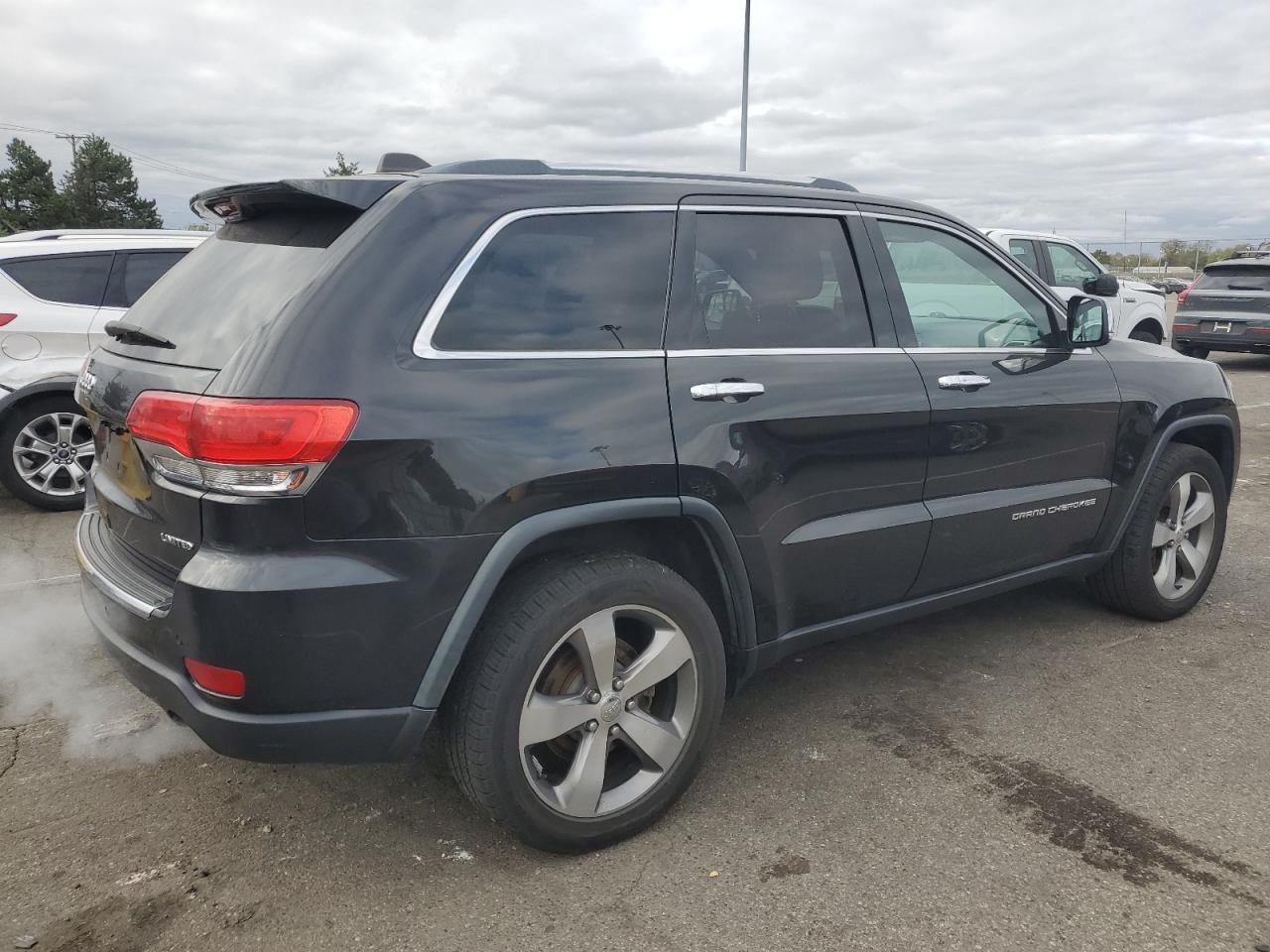 2014 Jeep Grand Cherokee - Image 3