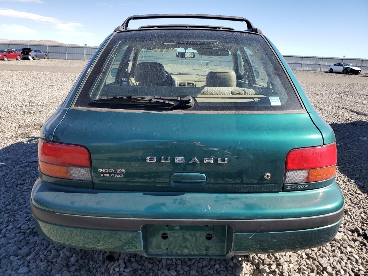 1997 Subaru Impreza L VIN: JF1GF4352VG821519 Lot: 76420034