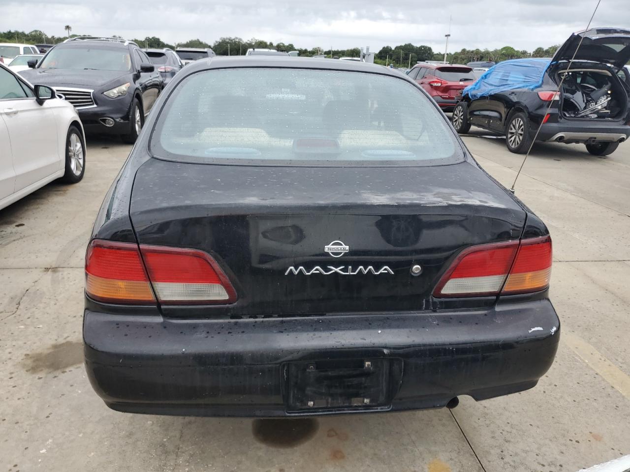 1998 Nissan Maxima Gle VIN: JN1CA21D9WT615826 Lot: 74483434