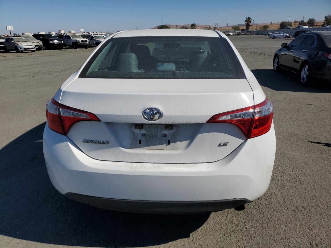 2016 Toyota Corolla L VIN: 5YFBURHE4GP379974 Lot: 77647414
