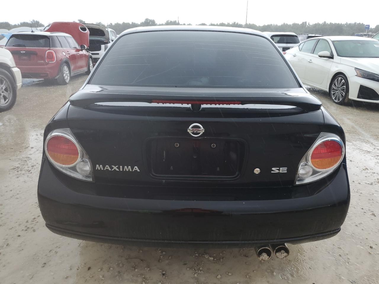 2002 Nissan Maxima Gle VIN: JN1DA31D42T427865 Lot: 74374134