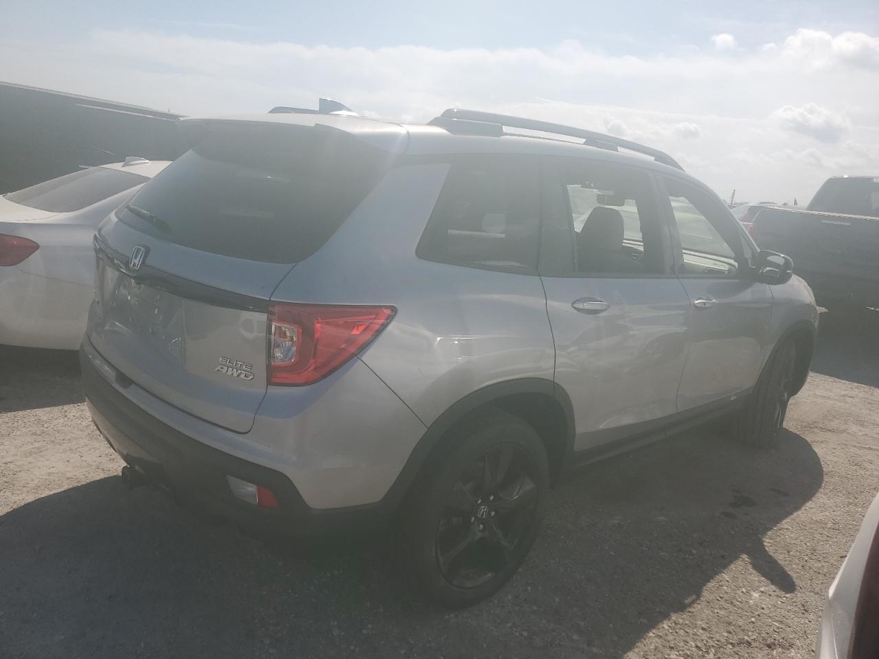 2019 Honda Passport Elite VIN: 5FNYF8H09KB009398 Lot: 74411524