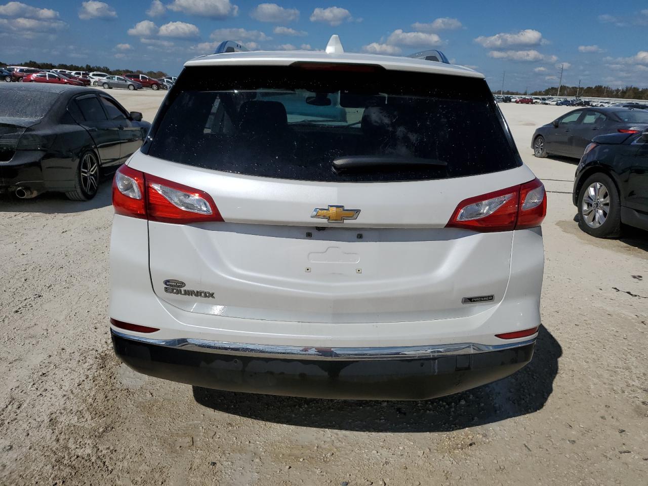 2018 Chevrolet Equinox Premier VIN: 2GNAXMEV5J6180118 Lot: 74903624